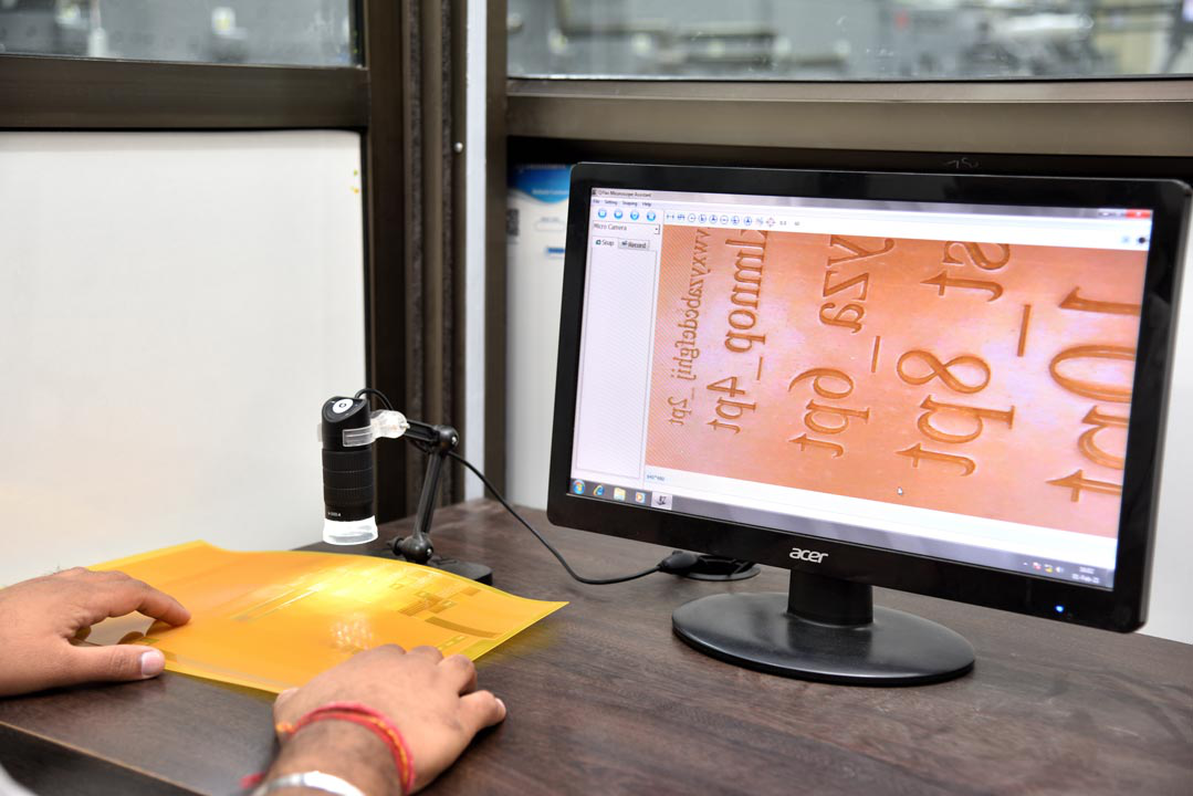 Micron precision inspection and quality control in label printing for high accuracy results